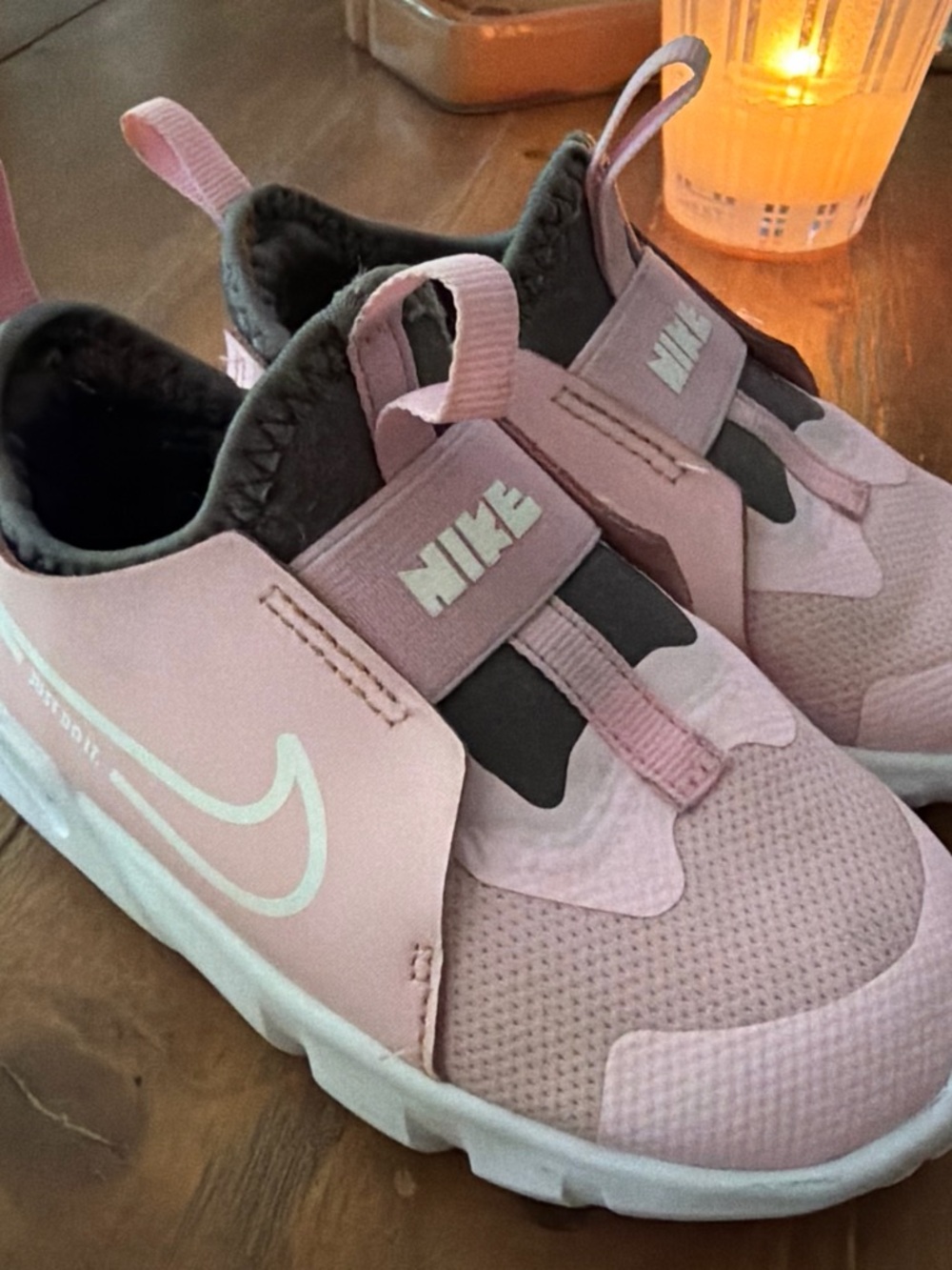 Nike Kids Pink Slip-On Athletic Sneakers with White Swoosh